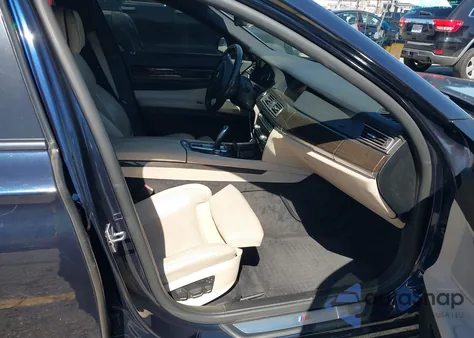 2011 BMW 750Li z USA, uszkodzony, nr VIN WBAKB8C53BCY66427